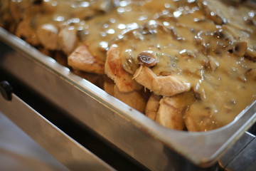 Chicken with Mushroom Gravy in a Chaffing Pan