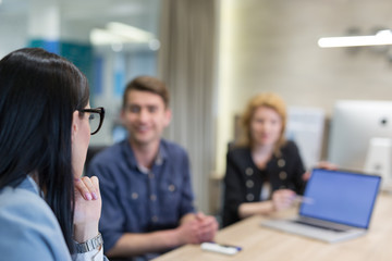 Startup Business Team At A Meeting at modern office building