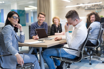 Startup Business Team At A Meeting at modern office building