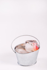 Cherry Ice Cubes in a Bucket