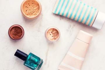 Woman beauty products flatlay on white marble background. Minimal style, fashion blogging concept. 