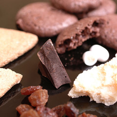 Almond biscuits, raisins, dark chocolate and parmesan cheese.