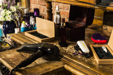 Hairdressing tools on a vintage table