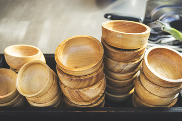 wooden bowls outside a restaurant, store, office or other