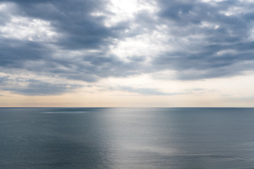 Naklejka na ściany i meble Image of the sea with beautiful blue sky before sunset background