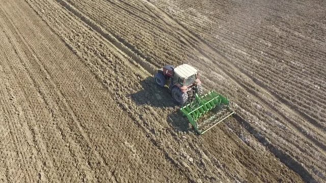 Harvester crop industrial footage overhead aerial vineyard harvest agriculture rows and lines by drone