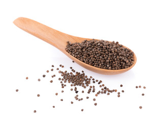 Perilla herb seed in wooden spoon on white background