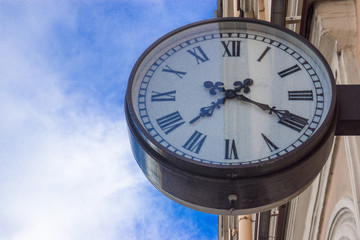 Fototapeta premium wall clock on the street