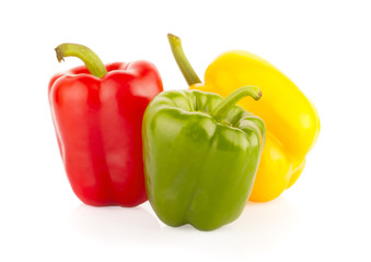 Fresh vegetables Three sweet Red, Yellow, Green Peppers isolated on white background.