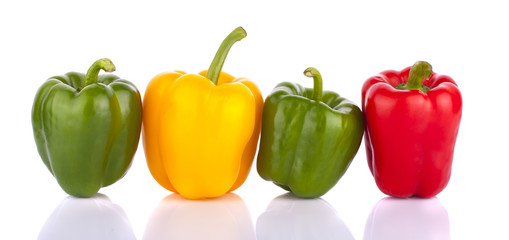 Fresh vegetables Three sweet Red, Yellow, Green Peppers isolated on white background.