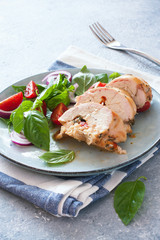 Baked chicken breast and fresh basil and tomatoes salad