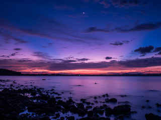 Fototapeta na wymiar sunset at the rock beach