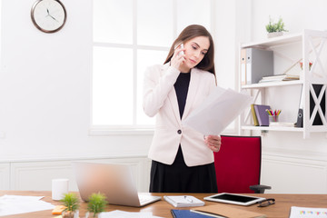 Business talk, woman consulting by phone at office