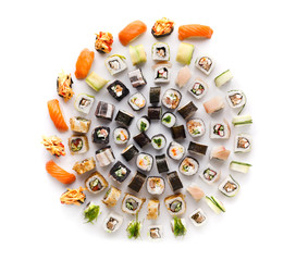 Sushi set for big party. Japanese food on white background © Prostock-studio