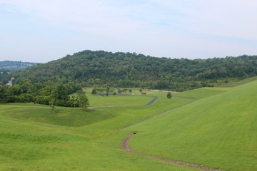 The view of the picnic area from the top of the lake dam.