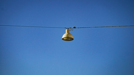 Lamp / Lightning hanging above a shopping street