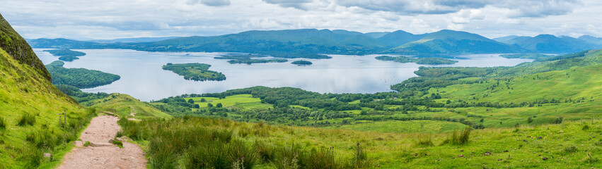 Fototapeta na wymiar Panoramic sight from Conic Hill, Balmaha, village on the eastern shore of Loch Lomond in the council area of Stirling, Scotland.