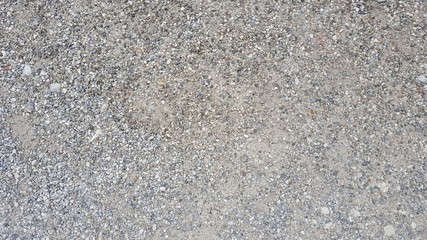 Pebbles on a gravel pathway (from far up).