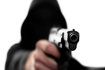 Unrecognizable man in hooded sweatshirt with handgun isolated on white background 