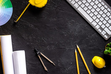 Architect workplace. Tools on black stone desk background top view copyspace