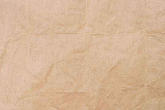 creased brown paper texture background