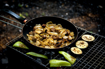 Stew vegetables meat pan coals bbq grill