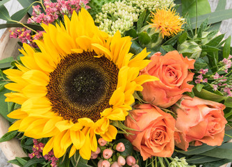 Fototapeta premium Close up of rustic sunflower arrangement.Top view.