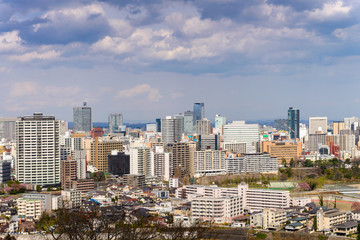 Fototapeta na wymiar Cityscape of miyagi city. aerial view of skyscraper, office building and downtown of sendia with blue sky background. Japan, Asia