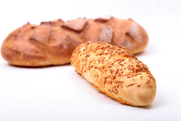 Assorted Fresh homemade bread on white background. Selective focus