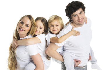 Obraz premium Parents giving children piggy back ride