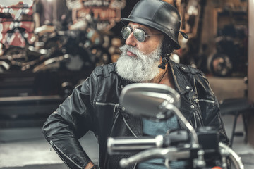 Interested old man ready for ride