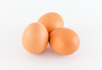 Group of brown raw eggs, isolated on white Background
