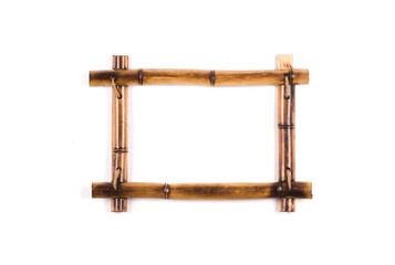 Empty bamboo frame on white isolated background