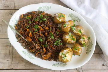 Roast beef ground with vegetables and baked potato