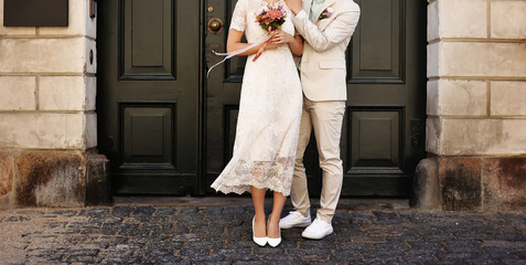 Young and happy married couple walking around