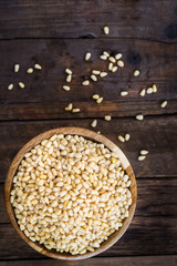 Shelled Raw Pine Nuts in the Wooden Bowl