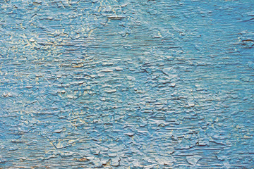 Blue painted brown wood surface as background. Wood texture.