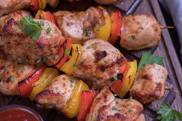Grilled pork kebab with red and yellow pepper