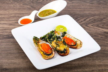 Baked mussels with spinach