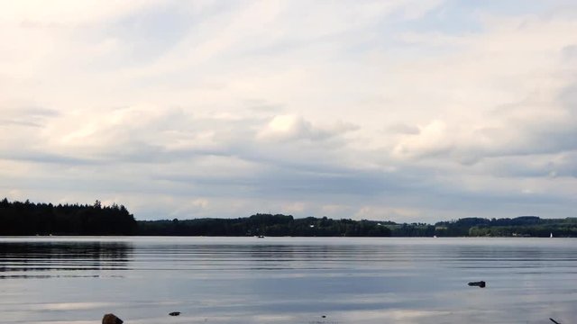 Clouds over a lake - Timelapse