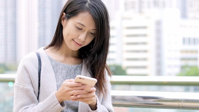 Asian Woman use of cellphone