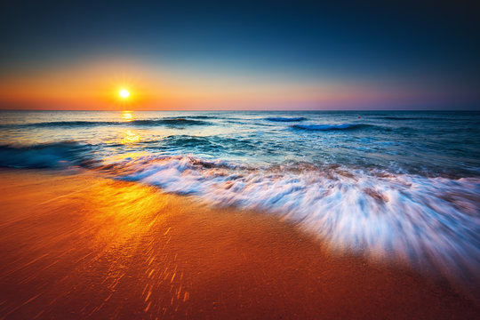 Fototapeta Beautiful sunrise over the sea