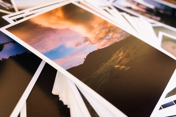 Printed photos on table