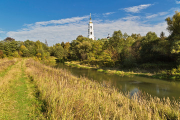 Obraz premium field in the autumn with country church
