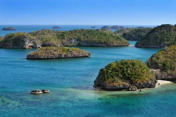 Cluster of small islands in Hundred Islands National Park, Pangasinan, Philippines.