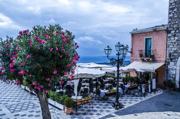 Panoramic view from a food court of the surroundings of the city of taormina - 167728381
