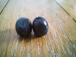 Olive over Wood Background
