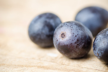 Red grapes on wooden background,Healthy fruit