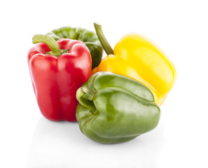 Fresh vegetables Three sweet Red, Yellow, Green Peppers isolated on white background..