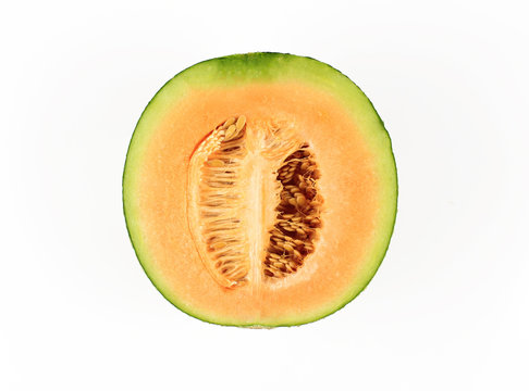 Fresh yellow melon or cantaloupe on white background